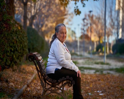 Smiling mature woman enjoying a relaxing day outdoors in natural light